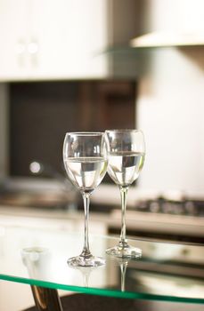 Two cups for wine in kitchen interior