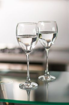 Two cups for wine in kitchen interior