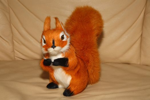 toy, plush redhead squirrel, macro photo, portrait