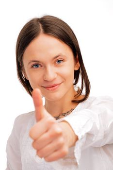 Close-up of a young  woman showing thumbs up over whire background