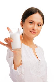 Portrait of beautiful woman holding glass of milk