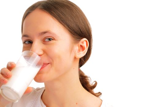 Portrait of beautiful young woman drinking milk