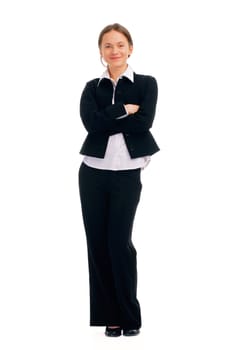 Smiling confident young Caucasian business woman with hands folded isolated over white background 