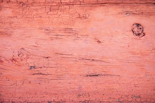 texture aging crackinged red paint on wooden board
 