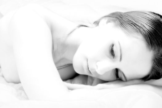 Young beauty woman in high key toning