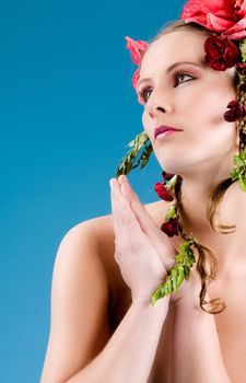 Young woman with big flowers in her hair