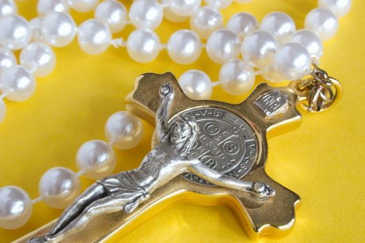 decorative rosary with pearls and christ on the cross