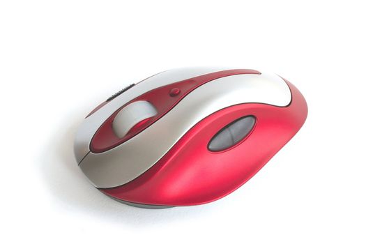 red and silver wireless computer mouse against a light background
