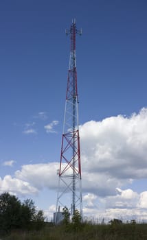 Tower of cellular communication on a background of the blue sky