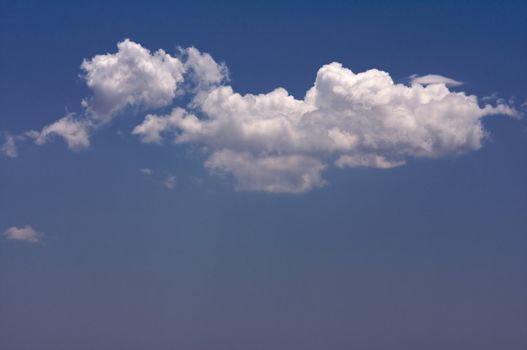Puffy Clouds on a blue sky.