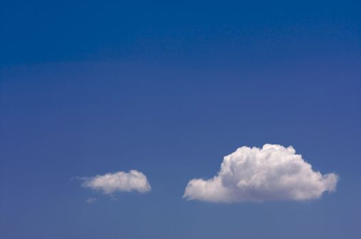 Puffy Clouds on a blue sky.