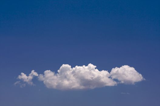 Puffy Clouds on a blue sky.