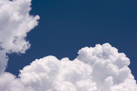 Puffy Clouds on a blue sky.