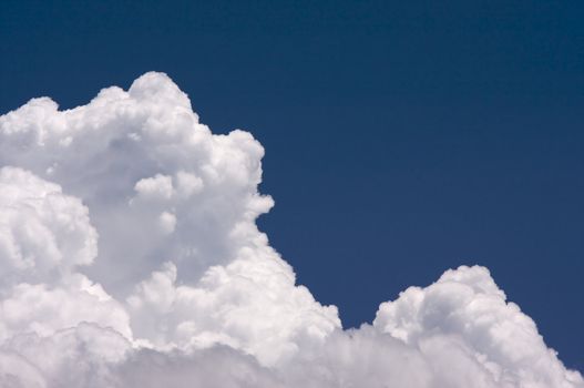 Puffy Clouds on a blue sky.