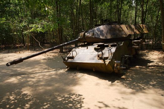 An American tank remains in the jungle near the Chu Chi tunnels in Vietnam.
