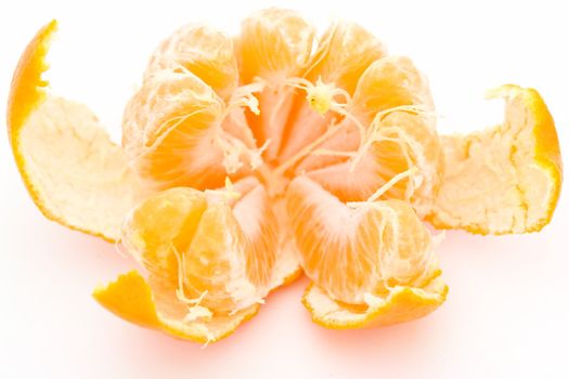 One juicy tangerine on a white background