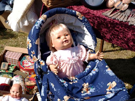 Antique Doll in a flea market on display