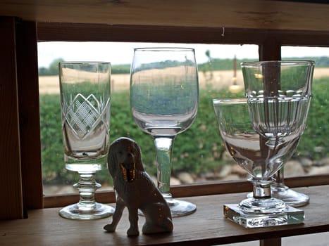 Beautiful decorative antique green wineglasses on display    