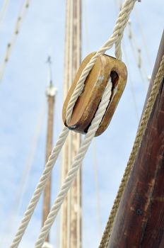 Close-up of block with ropes on a vintage sailboat