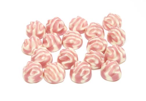 Soft striped candies on white