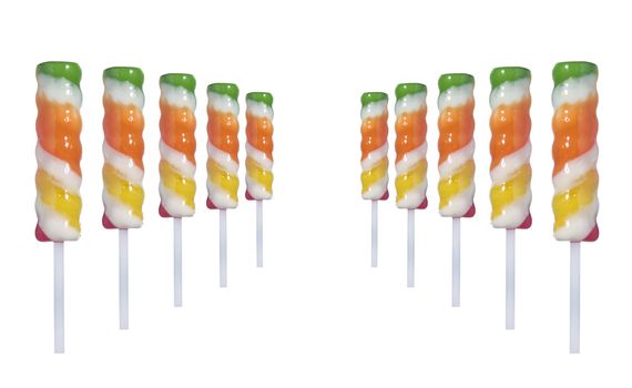 Ten lollipop sticks in a perspective disposition over white background.