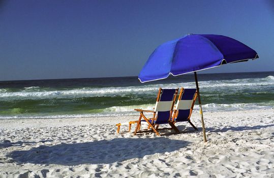 Two chairs on the beach at Ft. Walton Beach in the Panhandle.