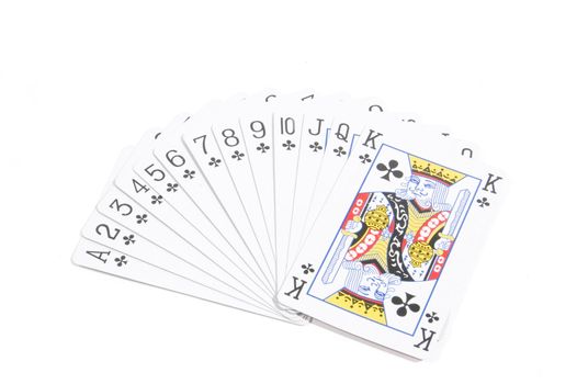 deck of clubs playing cards spread out
