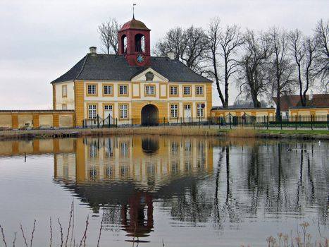 Castle reflected in the water Valdemar Slot Denmark