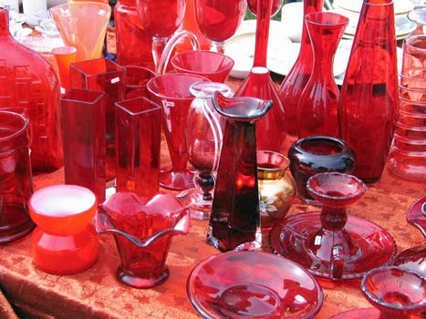Red glass item in a flea market stand in Denmark