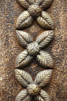 bronze engraving of a flower that used for home decoration