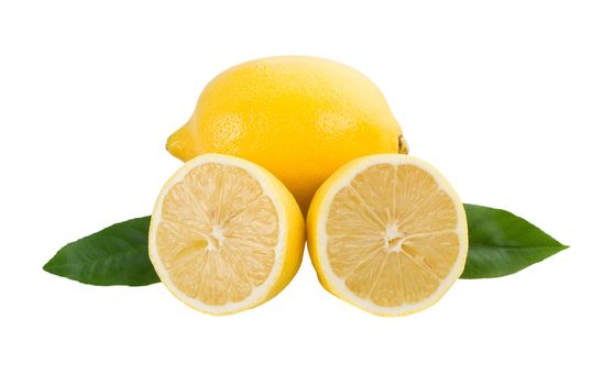 close-up lemon full and half with leaves, isolated on white