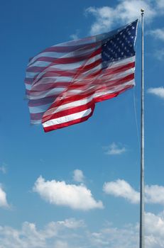Sequence photo of stars and stripes waving in the wind on a sunny day