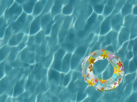 Top view of inner tube floating on sunbathed swimming pool - high resolution large file