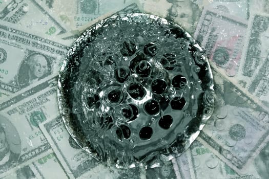 Digital composition of dollars being flushed down the drain