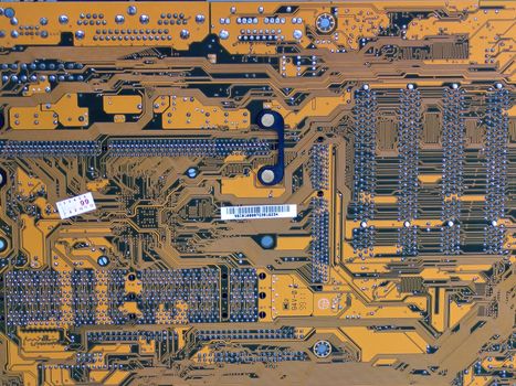 Computer motherboard electronic printed circuit board in close-up view