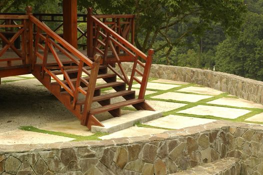 A brown wooden stairs at the park