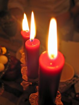Candles lights create festive, cosy and romantic atmosphere