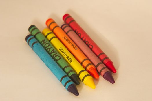 set of six wax crayons in a row