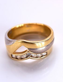 wedding rings on top of each other
