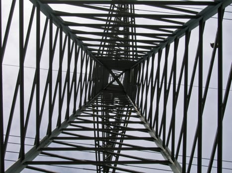 High voltage elecricity tower taken from the ground up 
