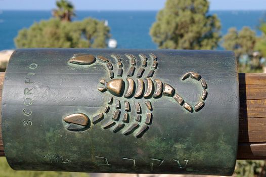 Scorpio sign icon engraved on a copper plate