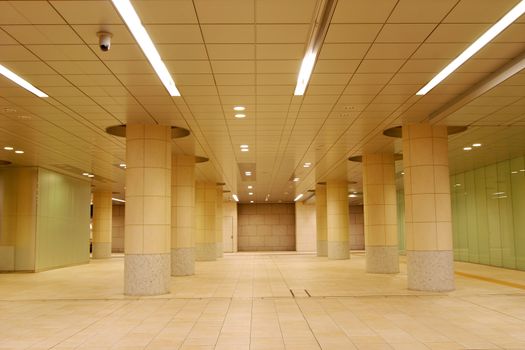 modern architectural background, it is pedestrian walkway space in Tokyo's Shiodome area empty at late time