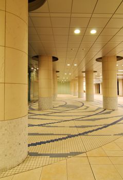 modern architectural background, it is pedestrian walkway space in Tokyo's Shiodome area empty at late evening time