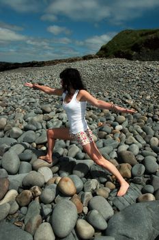 a beautiful woman doing yoga to show a healthy way to live a happy and relaxed lifestyle in a world full of stress