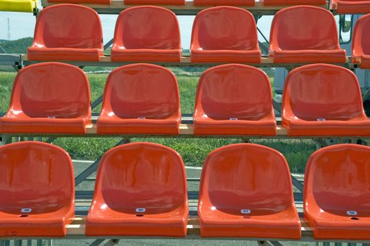 Lines of red seats.