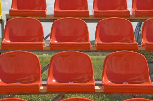 Lines of red seats.