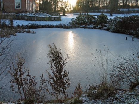 Small lake in frosty situation in the middle of the winter