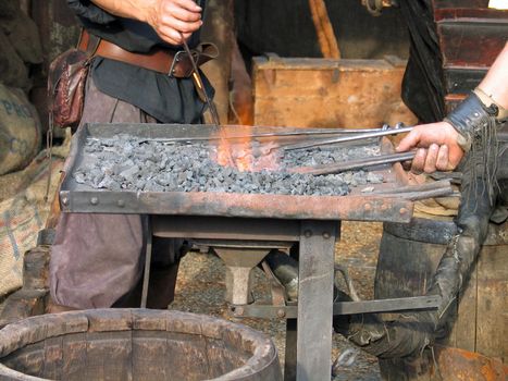 Close details of blacksmith work in medieval tradition style