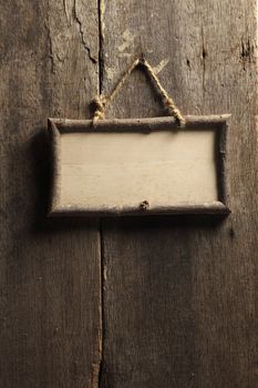 wooden board hanging on the wall