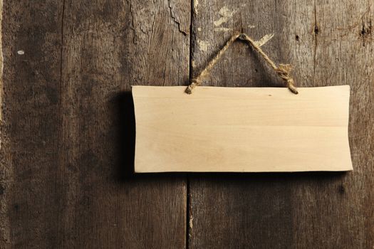 wooden board hanging on the wall